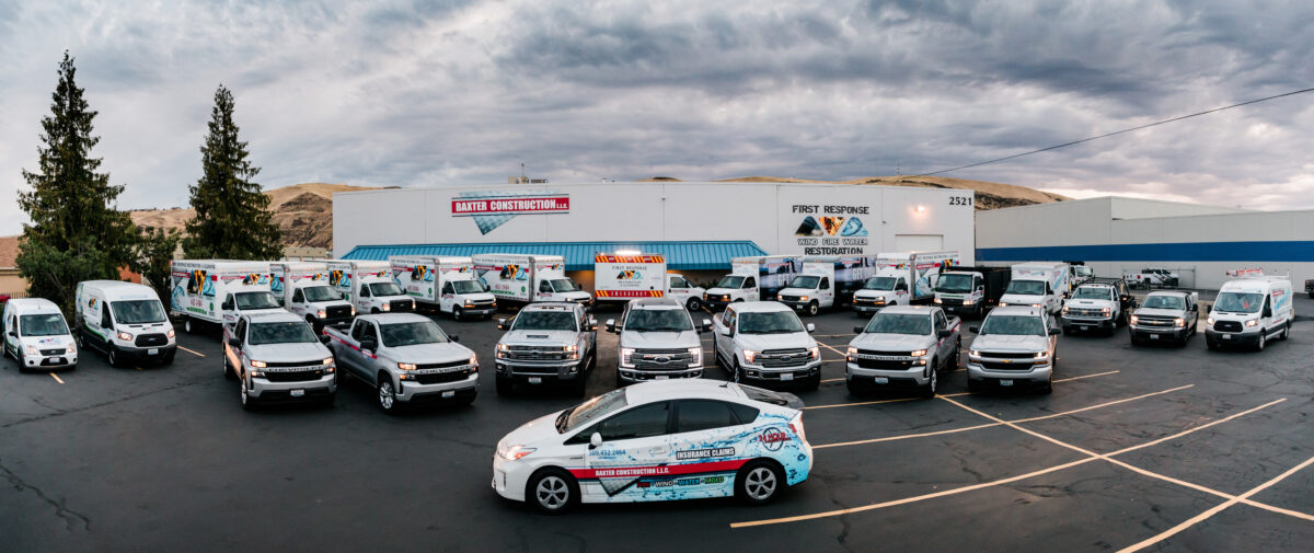 Baxter Construction & Restoration fleet of vehicles ready for action