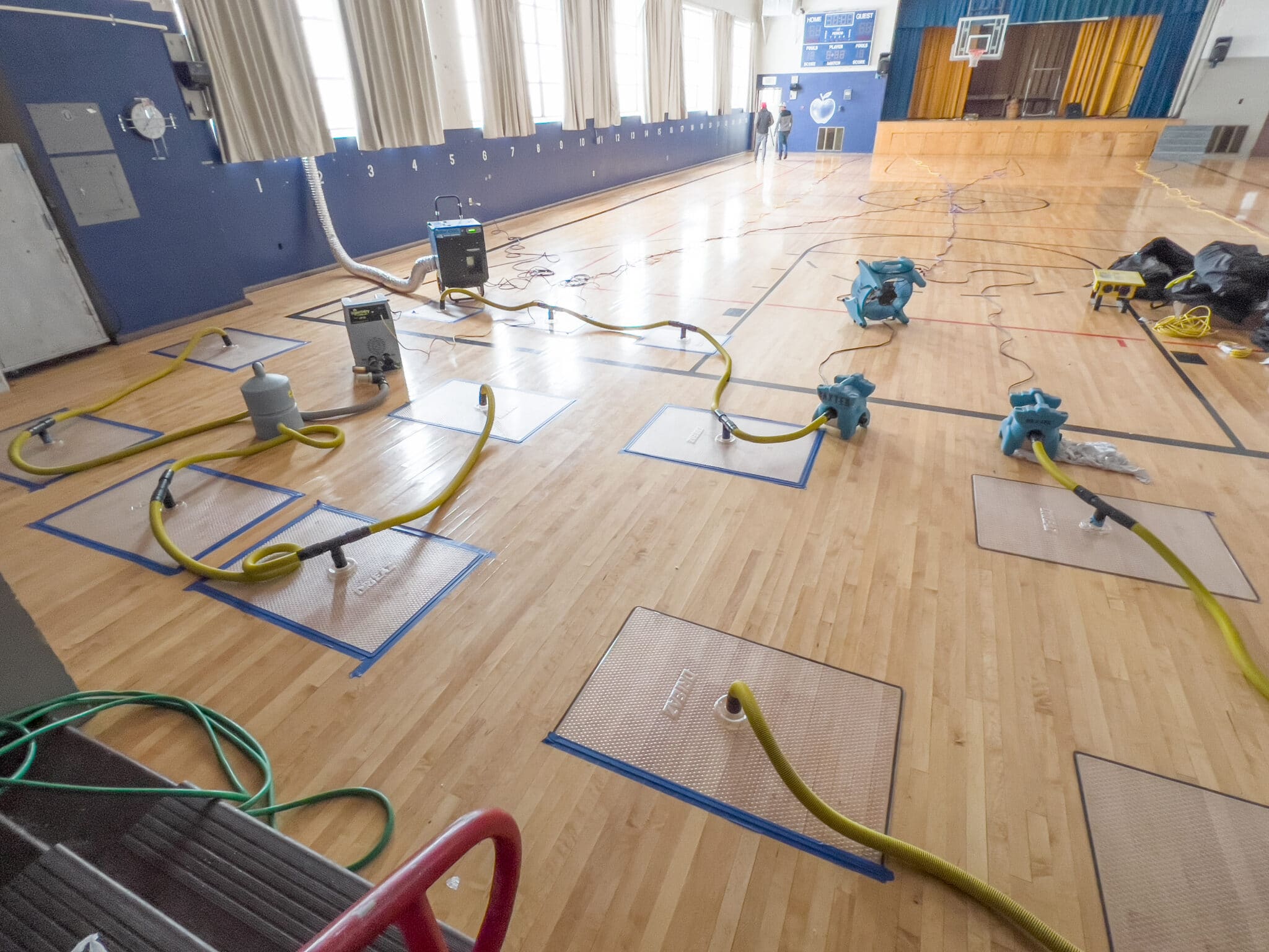 Water damage flooding restoration at school gym in Yakima WA