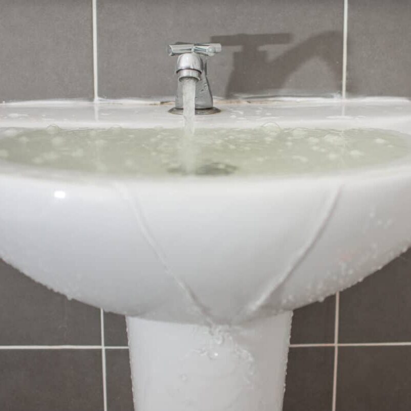 sink overflowing can cause water and flood damage